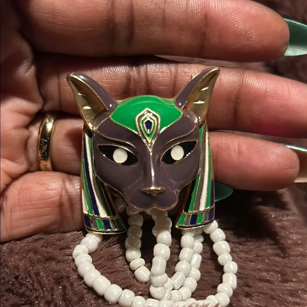 Egyptian Cat-Themed Beaded Brooch with Gold and Green Accents